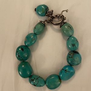 Beautiful turquoise bracelet with sterling silver hook.